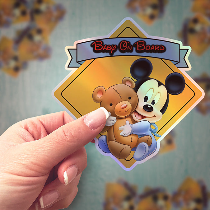 Baby Mickey Hugging a Teddy Bear - Baby on Board Car Window Sticker - Waterproof & Holographic - Eye-catching Yellow Diamond Shape