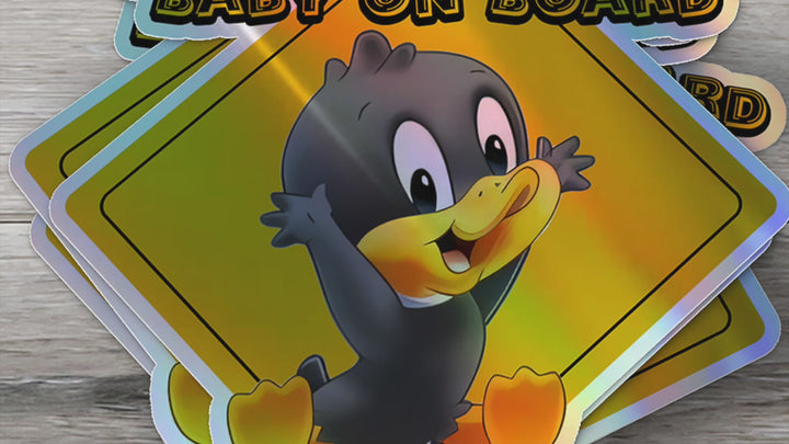 Baby on Board Car Window Sticker -Looney Tunes "Daffy Duck"-Waterproof & Holographic - Eye-catching Yellow Diamond Shape